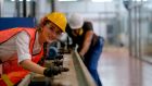 Changing perceptions: apprenticeships have been traditionally associated with the construction and motor industries and with young men. Photograph: Getty