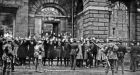 Prisioners under guard after the Custom House battle in May 1921. Photograph: Independent News And Media/Getty Images