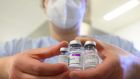 Three vials with different vaccines against Covid-19 by Pfizer-BioNTech, AstraZeneca and Moderna. File photograph: Thomas Kienzle/AFP via Getty Images