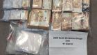 The €35,000 worth of cocaine and €140,000 in cash that was found in Kilmore on Saturday. Photograph: An Garda Síochána