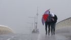 Heavy rain conditions on Samuel Beckett Bridge in Dublin earlier in May. File photograph: Stephen Collins/Collins Photos
