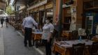 Monastiraki district of Athens: Cafes and restaurants have reopened  for sit-down service for the first time in nearly six months. Photograph: Petros Giannakouris