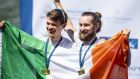 Fintan McCarthy and Paul O’Donovan  of Ireland pose on the podium after their win in the men’s lightweight double sculls final at  the Rowing World Cup on Lake Rotsee in Lucerne. Photograph: Urs Flueeler/EPA