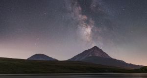 Errigal Nightscape, by Patryk Sadowski: the night sky at Loch an Ghainimh, or Lough Agannive, in Co Donegal, with Mount Errigal in the background