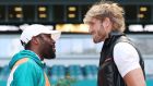 Floyd Mayweather and Logan Paul face off during a press conference to announce their June 6th fight  at Hard Rock Stadium in Miami Gardens, Florida. Photograph:  Cliff Hawkins/Getty Images