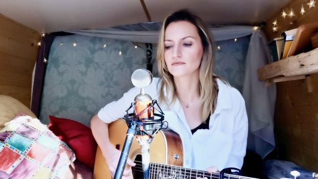 Musician Tracy Gallagher inside her converted campervan, which she renovated at a cost of €5,000