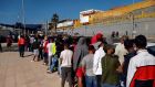  Moroccan migrants wait in a long queue  at Tarajal border crossing in Ceuta, Spanish enclave in northern Africa.  Most of the asylum seekers entered Ceuta on May 17th/18th  when some 10,000 people managed to reach Spanish territory. Photograph: Reduan Dris/EPA 