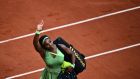 Serena Williams  acknowledges the audience as she leaves the court after losing against Kazakhstan’s Elena Rybakina in the fourth round at the French Open. Photograph: Anne-Christine Poujoulat/AFP via Getty Images