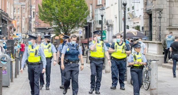 Gardaí on patrol in Dublin city centre on Sunday evening. Photograph: Tom Honan/The Irish Times. 
