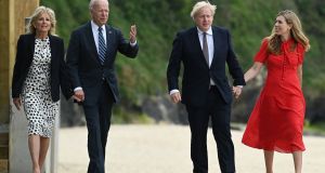 Britain’s prime minister Boris Johnson (2R) and his wife Carrie Johnson (R) walk with US president Joe Biden and US First Lady Jill Biden prior to a bi-lateral meeting at Carbis Bay, Cornwall. Photograph: Brendan Smialowski/AFP via Getty
