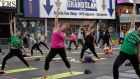 Kathryn Garcia, a Democratic candidate for New York City mayor, does yoga in Times Square in Manhattan on Sunday. Photograph: Michelle V Agins/The New York Times