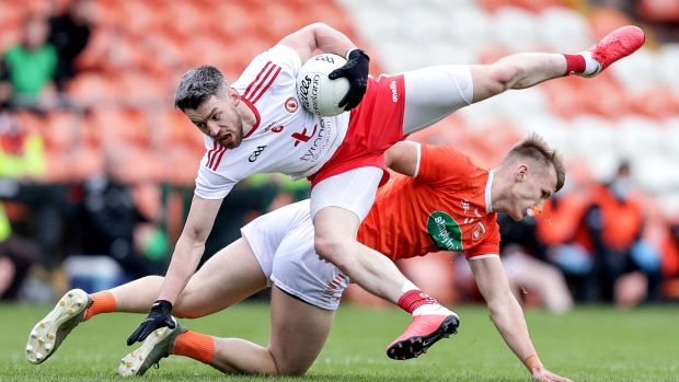 Tyrone’s Matthew Donnelly and Rian O’Neill of Armagh in action during the Allianz Football League Division 1 North game at the Athletic Grounds. Photograph: Laszlo Geczo/Inpho