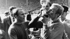 England’s Bobby Moore kisses the Jules Rimet Cup following his team’s defeat of West Germany in the World Cup Soccer Championship, July 30th, 1966. (Original Caption). Photograph: Bettmann/Getty