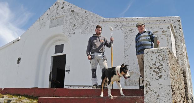 Painter James Cawley and John Cummins, the sacristan at St Patrick’s Oratory   on Croagh Patrick, looking after the maintenance and painting work. Photograph: Conor McKeown