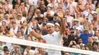  Roger Federer celebrates his victory over  Richard Gasquet of France