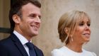 French President Emmanuel Macron, pictured with his wife Brigitte Macron, is considering reviving the controversial overhaul, and perhaps attempting to raise the retirement age. Photograph:  Ludovic Marin / AFP via Getty Images