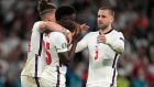 Luke Shaw and Kalvin Phillips console Bukayo Saka after his missed penalty against Italy. Photograph: Frank Augstein/AP