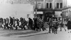 British paratroopers take away civil rights demonstrators on Bloody Sunday after the paratroopers opened fire on a civil rights march, killing 14 civilians. Photograph: Getty 