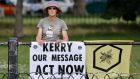 Join the Kew: An Extinction Rebellion climate activist stands outside Kew Gardens in London where US climate envoy John Kerry gave a speech on Tuesday. Photograph: Tolga Akmen/AFP