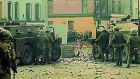 People confront British soldiers on William Street in Derry minutes before paratroopers opened fire, killing 14 civilians on what became known as Bloody Sunday. Photograph: Getty