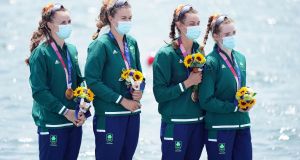Emily Hegarty, Fiona Murtagh, Eimear Lambe and Aifric Keogh collect their bronze medals for the women’s four on the fifth Photograph: Mike Egerton/PA