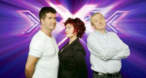The X Factor: the first series featured Simon Cowell, Sharon Osbourne and Louis Walsh as the judges. Photograph: Talkback Thames/PA