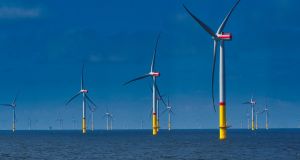 An offshore wind farm. Turbines can now be mounted on a floating platform that is then secured to the seabed by mooring cables and anchors.