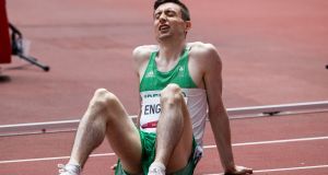 Mark English looks dejected after his fourth place finish in the heats of the 800m in Tokyo. Photograph: Morgan Treacy/Inpho