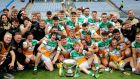 Offaly players and staff celebrate after their victory over Derry in the Christy Ring Cup final at Croke Park. Photograph: Ryan Byrne/Inpho