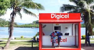 A Digicel store in Fiji. Telstra’s AU$2 billion bid for Digicel Pacific would be backed with a loan from the Australian government. File photograph: Getty