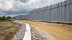 Greece is reinforcing the Greek Turkish border along the wetlands of the Evros river  with  a five-metre tall fence,  cameras, drones, heavy vehicles and security personnel. Photograph:  Nicolas Economou/NurPhoto via Getty Images