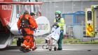 Rescued: Sara Feeney is taken off a Coast Guard helicopter at University Hospital Galway in August 2020. Photograph: Aengus McMahon