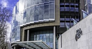 The Criminal Courts of Justice building in Dublin. A property developer, a solicitor and an accountant have been sent forward for trial following an investigation into alleged property registration fraud. 