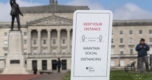 A social distancing sign in the Stormont Estate in Belfast. The North’s Department of Health has reported a further eight deaths of people with  Covid-19. Photograph: Brian Lawless/PA Wire