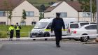 Gardaí are pictured on Mac Uilliam Road in Tallaght, Dublin on Wednesday after  a man (25) who was stabbed on the road on Tuesday night died in hospital. Photograph: Damien Eagers