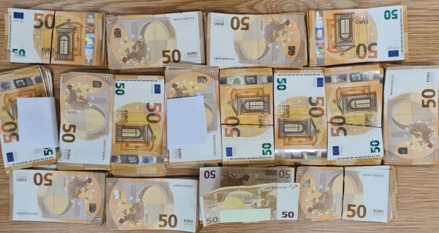 Some of the cash seized by gardaí in a series of raids on Thursday. Photograph: An Garda Síochána
