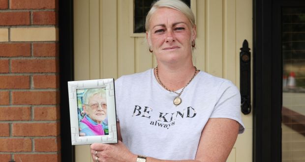 Susan Bracken holding a photograph of her mother Margaret Bracken, who died in unexplained circumstances in her home in Dundalk in 2019. Photograph: Alan Betson