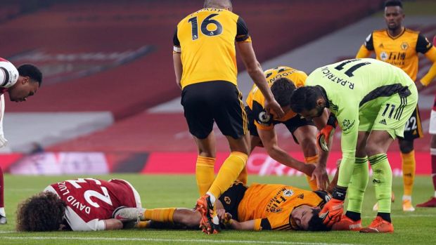 Raul Jimenez and David Luiz lay injured after clashing heads during the Premier League game at the Emirates Stadium last November. Photograph: John Walton/AFP via Getty Images