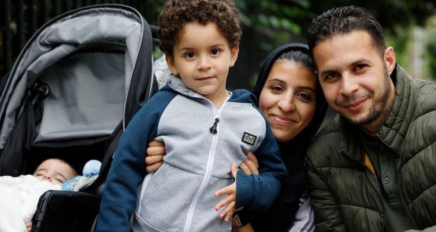 Sufyan ElGahmi with his wife, Enas, and their children, three-year-old Sanad and four-month-old Samer. Photograph: Alan Betson