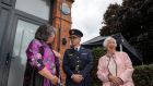 Orla McKeown (grandniece of Det Sgt  Patrick McKeown) and Marie Hyland (daughter of Det Garda Richard Hyland) with Garda Commissioner Drew Harris at the unveiling of a plaque to honour the two members of An Garda Síochána killed in duty 81 years ago. Photograph: Colin Keegan