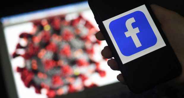 More than 190 million pieces of Covid-related content on Facebook had warnings displayed on them. Photograph:   Oliver Douliery/AFP via Getty Images)