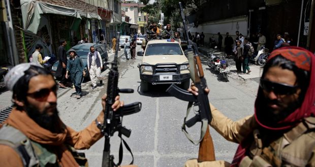 Taliban fighters on patrol in Kabul on Thursday. Photograph: Rahmat Gul/AP