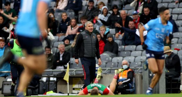 Mayo manager James Horan looks on as Eoghan McLaughlin lies injured following a challenge by Dublin’s John Small during the All-Ireland semi-final at Croke Park. Photograph:James Crombie/Inpho