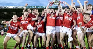 The Cork  team celebrate their win over Galway in the All-Ireland under-20 final at Semple Stadium on Wednesday. Photograph: Laszlo Geczo/Inpho