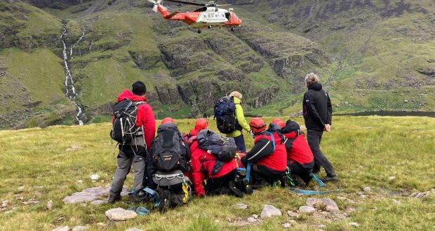 Kerry Mountain Rescue Team assisting a member of the public at Carrauntoohil. Photograph: KMRT