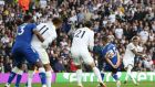 Raphinha bends the ball round Seamus Coleman to score Leeds’ equaliser against Everton. Photograph: Jan Kruger/Getty