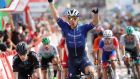 Fabio Jakobsen celebrates after winning Saturday’s eighth stage of the Vuelta. Photograph: Manuel Bruque/EPA