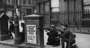 Free State soldiers fighting against Republican forces at O’Connell Bridge in Dublin  in July 1922. Photograph: Brooke/Topical Press Agency/Getty Images