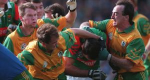 Mayo and Meath players get acquainted with each other during the 1996 All-Ireland final replay. Photograph: Inpho