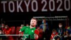 Colin Judge in action against Zhao Ping on the opening day of the Tokyo Paralympics. Photograph: Tommy Dickson/Inpho